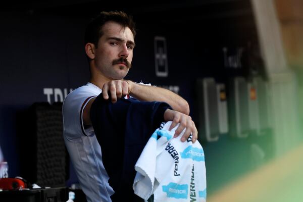 Braves pitcher Spencer Strider puts his jacket on in the dugout on April 12, 2023, at Truist Park in Atlanta.

Miguel Martinez /miguel.martinezjimenez@ajc.com