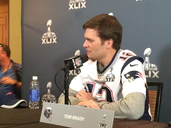 Tom Brady at his podium during a Super Bowl XLIX media session. (D. Orlando Ledbetter/dledbetter@ajc.com)