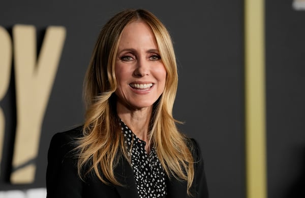 FILE - Dana Walden, co-chairman of Disney Entertainment, poses at the premiere of the documentary film "Road Diary: Bruce Springsteen and the E Street Band," Monday, Oct. 21, 2024, at The Academy Museum of Motion Pictures in Los Angeles. (AP Photo/Chris Pizzello, File)