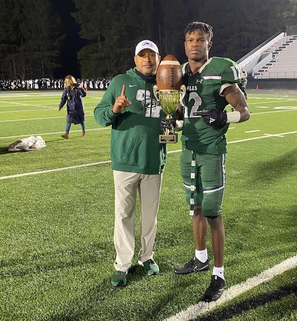 Former Collins Hill High standout Travis Hunter (right) poses for a photo with former Eagles wide receivers coach Todd Wofford after a game during the 2020 season. (Photo courtesy Todd Wofford)