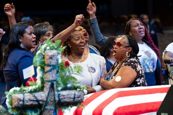 Meka Fortson (center) grieves during Friday's funeral.