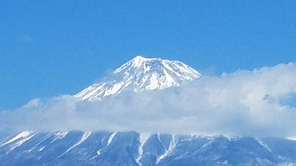 "I was on a train trip from Tokyo to Kyoto and was lucky to get this clear shot of Mt Fuji, ringed by clouds," wrote Mike Padilla of Athens.