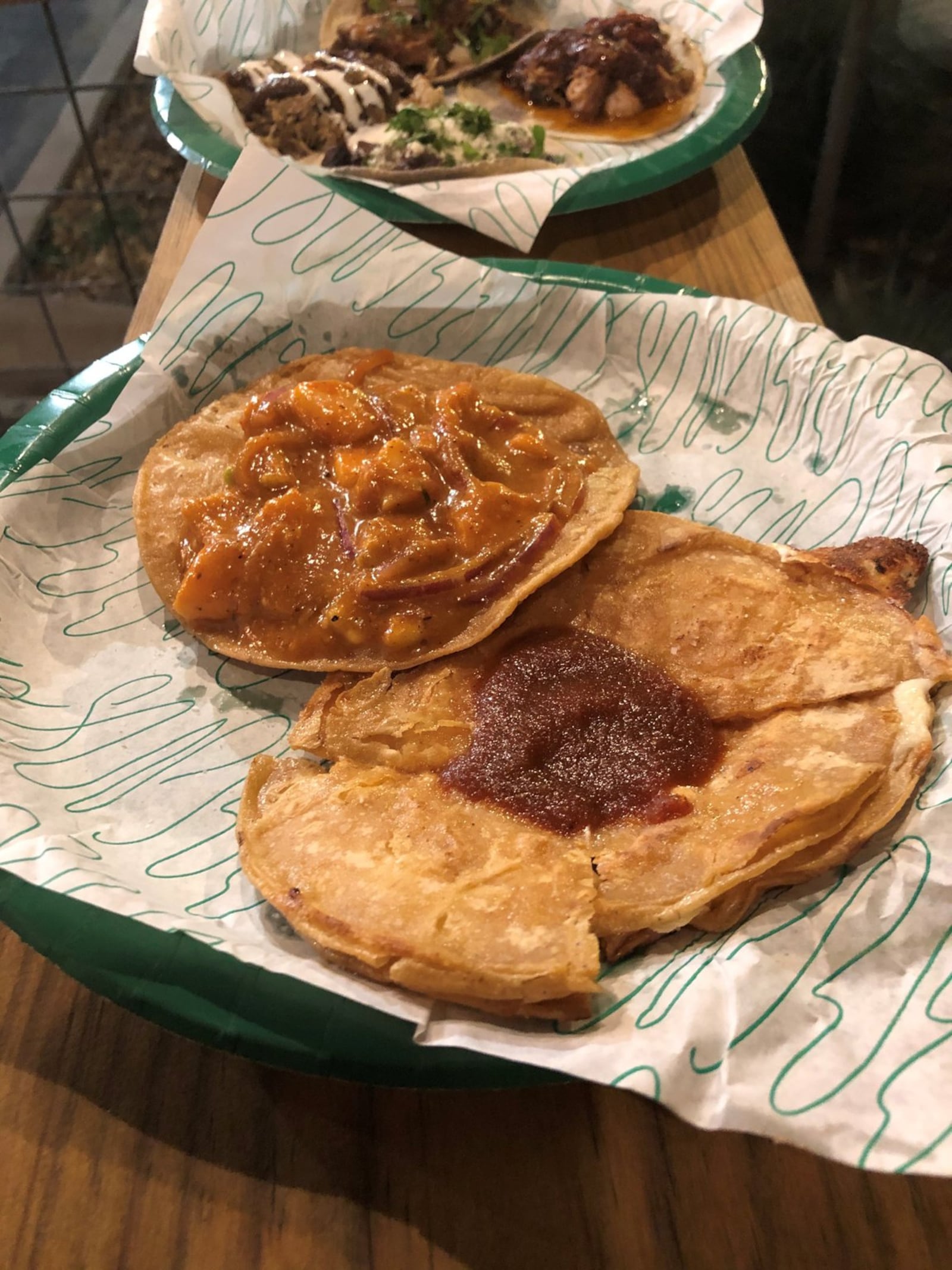 The aguachile tostada (with shrimp, avocado, onion, cucumber and puya) and the fried quesadilla at Supremo Taco. CONTRIBUTED BY WENDELL BROCK