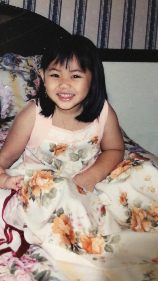 Here, 5 or 6-year-old Christie poses for a fun “photo shoot” she and her sister put on. CONTRIBUTED