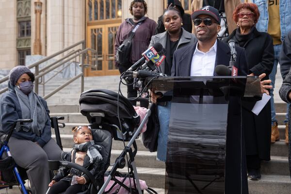 Hunter Hills homeowner Mahdi Chaney recalls his experience trying to barricade his home during the flash flood in September as his 2-year-old daughter watches on. Mahdi is part of a group of residents who announced on Feb. 29, 2024 that they are suing the city over flooding issues.