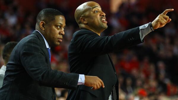 Georgia assistant coach Amir Abdur-Rahim (right) and Georgia assistant coach Chad Dollar during a men's basketball game between Georgia and LSU at Stegeman Coliseum on Saturday, Feb. 16, 2019. (Photo by Kristin M. Bradshaw/UGA)