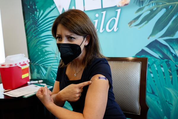 Dr. Mandy K. Cohen, Director of the CDC, reacts with character after she had the flu shot after she addressed her remarks during The Atlanta Press Club 2023 Leadership Newsmaker Series at the Commerce Club on Wednesday, Sep. 6, 2023, in Atlanta.
Miguel Martinez /miguel.martinezjimenez@ajc.com