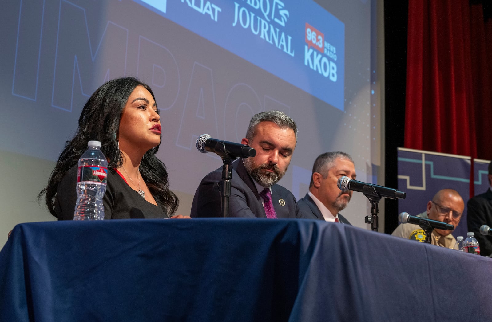 The Albuquerque Journal, KOAT and KKOB sponsored a town hall meeting on crime at the African American Performing Arts Center in Albuquerque, N.M., Wednesday, April 17, 2024. On the panel are, from left, Nicole Chavez, who lost her son in 2015 to violent crime and is now a candidate for the New Mexico House of Representatives, Attorney General Raul Torrez, Bernalillo County District Attorney Sam Bregman and Bernalillo County Sheriff John Allen. (Eddie Moore /The Albuquerque Journal via AP)