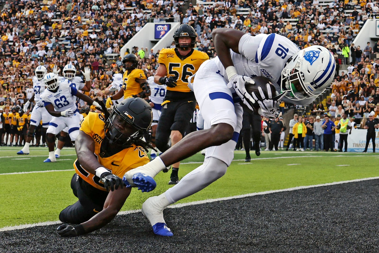 Georgia State wide receiver Ted Hurst gets past Appalachian State safety Zyeir Gamble for a touchdown in the first half of an NCAA football game, Saturday, Oct. 26, 2024 at Kidd Brewer Stadium in Boone, N.C. (Walt Unks//The Winston-Salem Journal via AP)