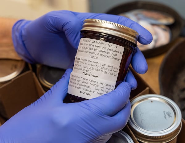 Mike Massey works on making one of his jam recipes in the kitchen of his Decatur home. He gives his homemade jams to the Lawrenceville co-op, a food bank serving Gwinnett & other Counties. PHIL SKINNER FOR THE ATLANTA JOURNAL-CONSTITUTION