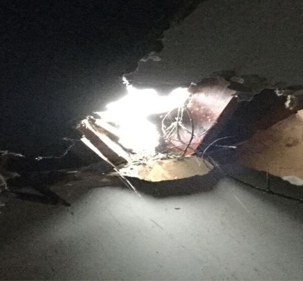 Three feet of daylight could be seen through the roof after the tree crashed through a bedroom. (Credit: Michelle Hiskey)