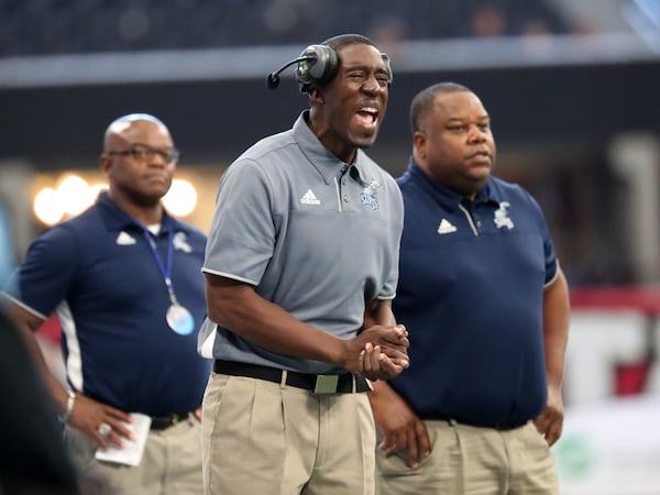 Cedar Grove coach Jermaine “Jimmy” Smith reacts during the Class AAA championship game against Peach County at Mercedes-Benz Stadium. Cedar Grove won 14-13. (JASON GETZ/SPECIAL TO THE AJC)