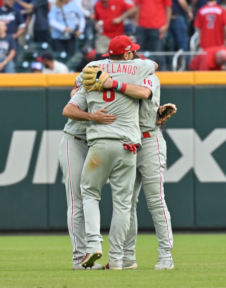 Phillies celebrate winning game one of the baseball playoff series between the Braves and the Phillies at Truist Park in Atlanta on Tuesday, October 11, 2022. (Hyosub Shin / Hyosub.Shin@ajc.com)