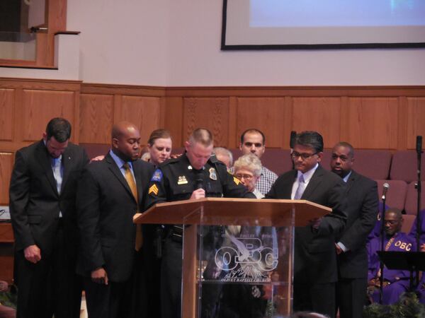 Sgt. Daniel Jones became emotional during his remarks at the interfaith service. Photo: Jennifer Brett