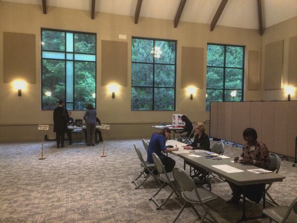 A handful of voters file into St. Jude Catholic Church on Glenridge Drive in Sandy Springs for Election Day on May 22, 2018.