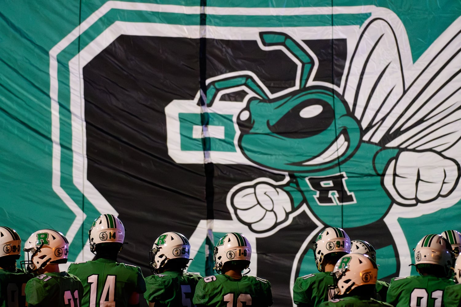 Roswell gets ready to take the field during the Alpharetta at Roswell football game, November 3, 2023. (Jamie Spaar for the Atlanta Journal Constitution)