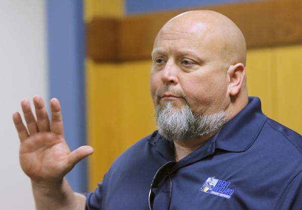 Kevin O’Neal prepares to testify about a 1990 case in which Tex McIver shot at a car O’Neal was in near McIver’s residence. BOB ANDRES /BANDRES@AJC.COM