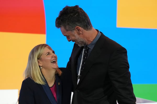 Kirsty Coventry congratulated by former NBA player Pau Gasol from Spain after she was announced as the new IOC President at the International Olympic Committee 144th session in Costa Navarino, western Greece, Thursday, March 20, 2025. (AP Photo/Thanassis Stavrakis)