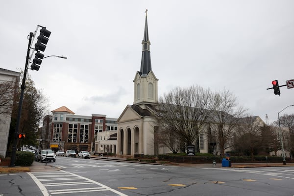 The Athens First United Methodist Church wants to knock down the Saye building at 110 W. Hancock Ave. and use the land for more parking spaces. Preservationists are trying to stop the demolition. Jason Getz/AJC