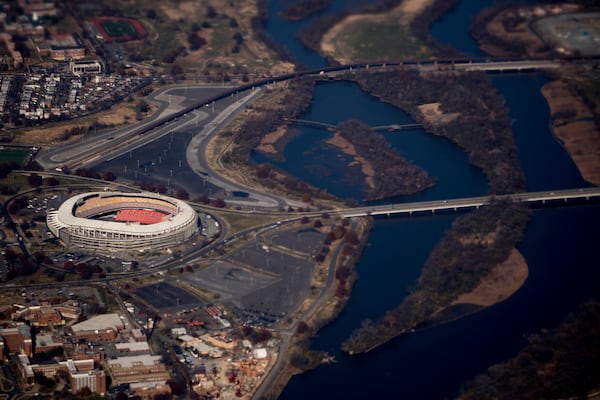 FILE - RFK Stadium is visible from Air Force One as it takes off from Andrews Air Force Base, Md., Wednesday, Nov. 29, 2017, as President Donald Trump flies to St. Louis to speak at a tax reform rally. (AP Photo/Andrew Harnik, File)