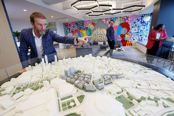 Brian McGowan, President of Centennial Yards, points out of the window of his 22th floor-office to the 50-acre property known as "the Gulch," which ranks among Georgia's largest development projects. 
Miguel Martinez /miguel.martinezjimenez@ajc.com