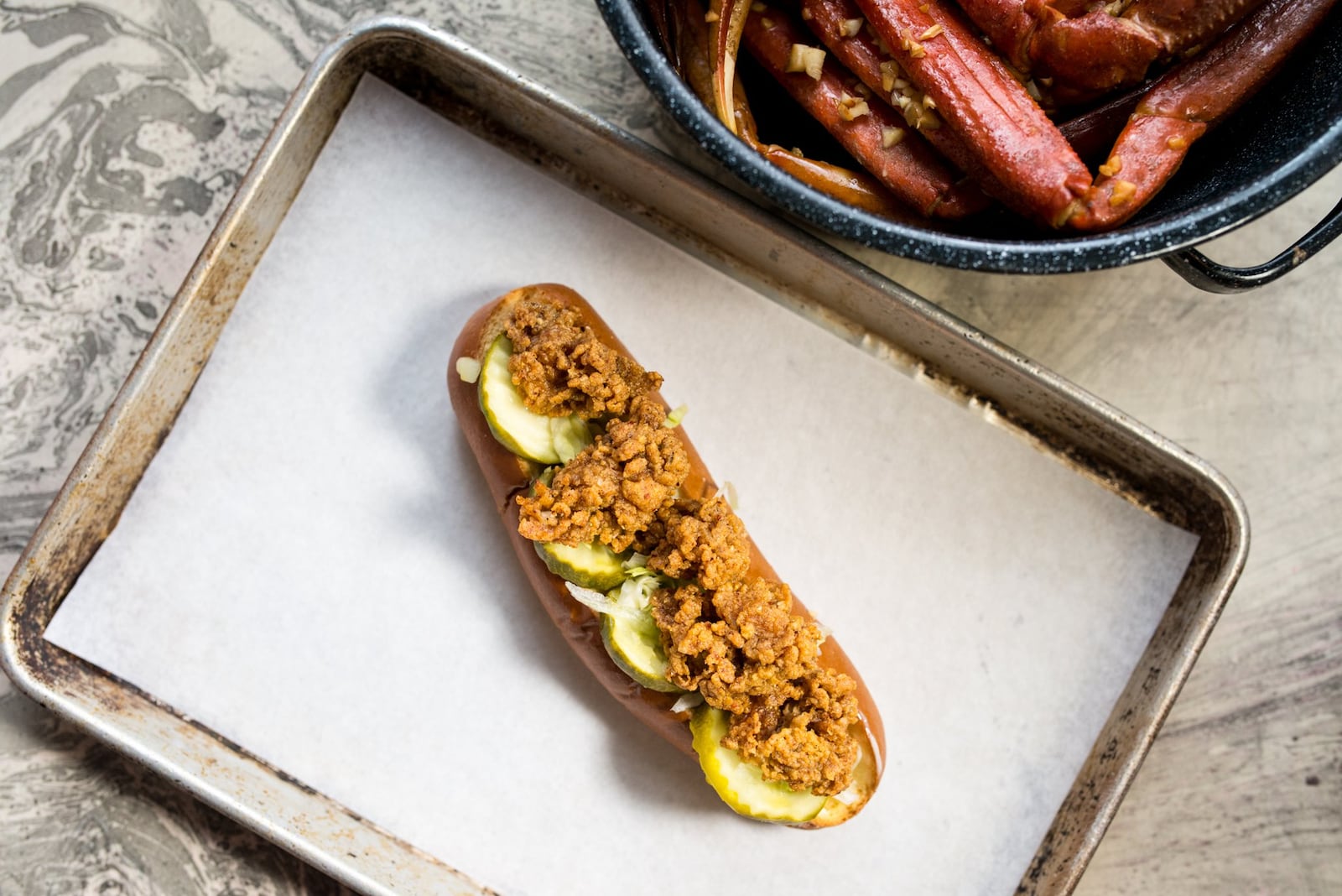  Nashville Hot Oyster Roll with lettuce, Duke's Mayo, and dill Pickle. Photo credit- Mia Yakel.