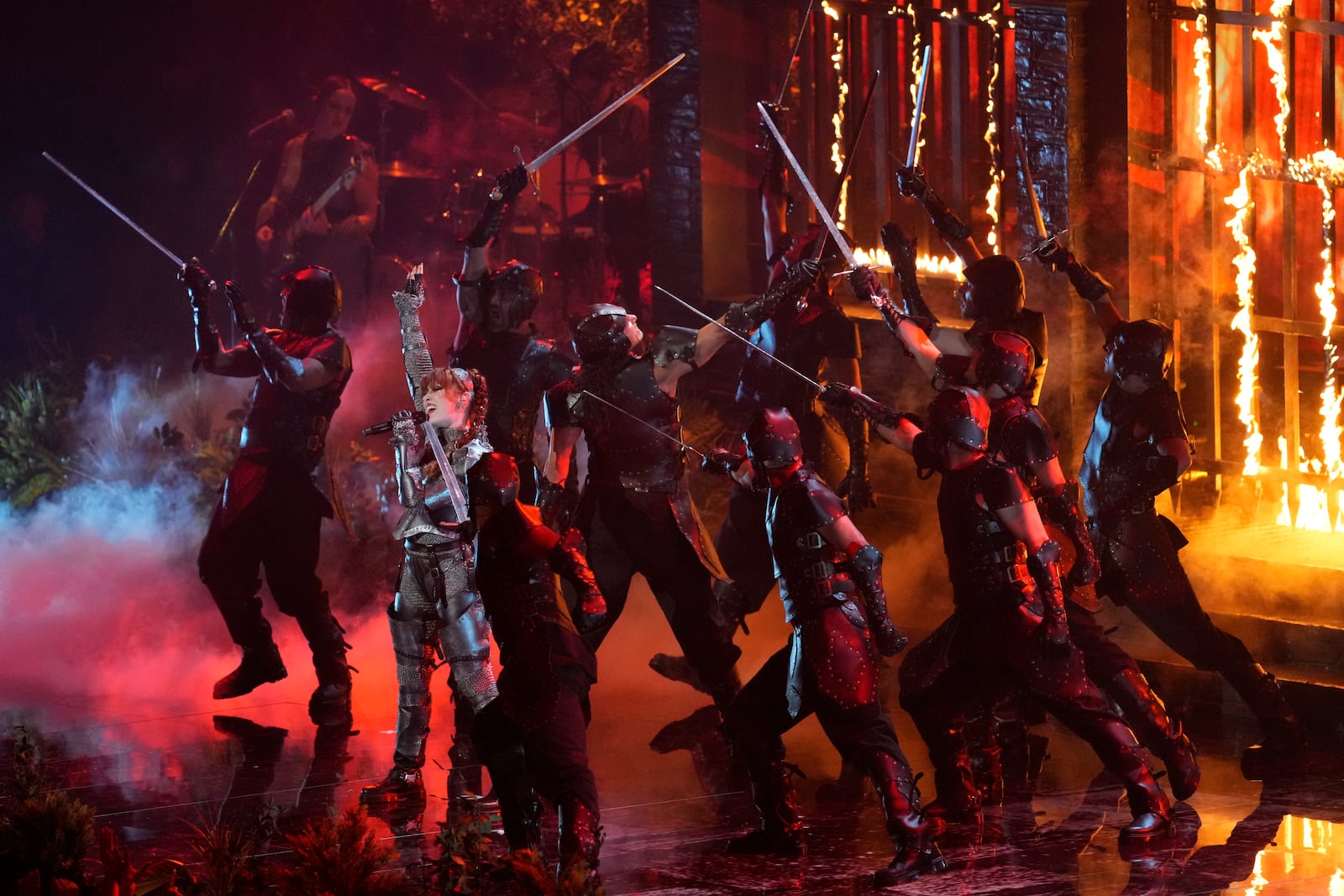 Chappell Roan, center, performs "Good Luck, Babe" during the MTV Video Music Awards on Wednesday, Sept. 11, 2024, at UBS Arena in Elmont, N.Y. (Photo by Charles Sykes/Invision/AP)