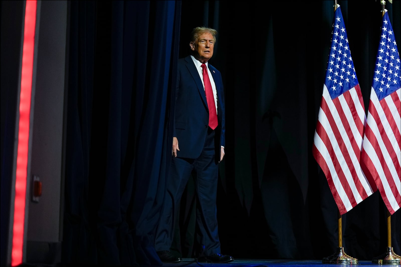 Republican presidential nominee former President Donald Trump arrives to speak at a meeting of the Detroit Economic Club, Thursday, Oct. 10, 2024, in Detroit. (AP Photo/Julia Demaree Nikhinson)