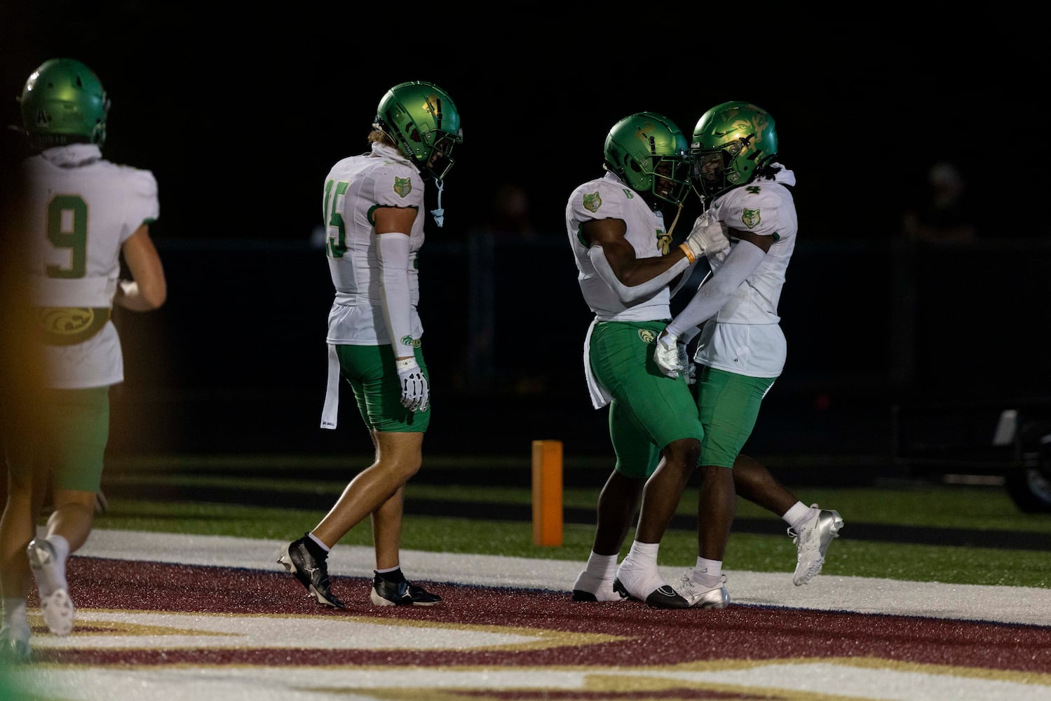 Buford players celebrate a touchdown. (Photo/Jenn Finch, AJC)