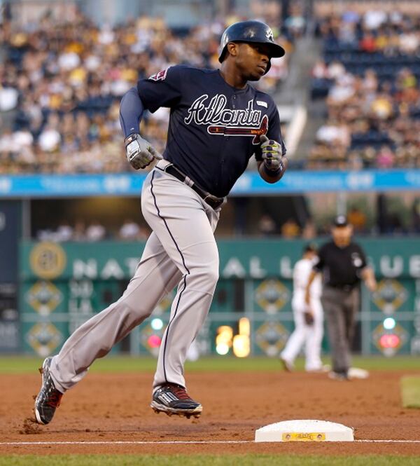 Atlanta Braves' Justin Upton rounds third after hitting a three-run home run in the third inning of the baseball game against the Pittsburgh Pirates on Tuesday, Aug. 19, 2014, in Pittsburgh. (AP Photo/Keith Srakocic) Rounding third and heading for home. (Keith Srakocic/AP)