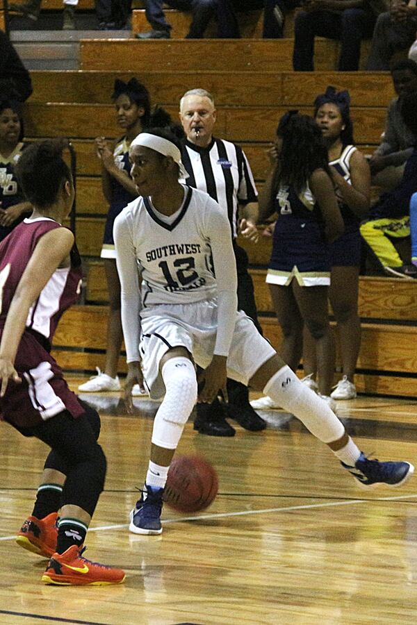 Jada Walton of No. 1 Southwest DeKalb dribbles in Friday's victory over Cross Creek in a Class AAAAA game Photo courtesy of DeKalb County Schools Athletics