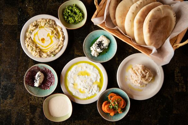 The mezze platter at Nur Kitchen offers plenty while you await your main dishes. (Mia Yakel for The Atlanta Journal-Constitution)