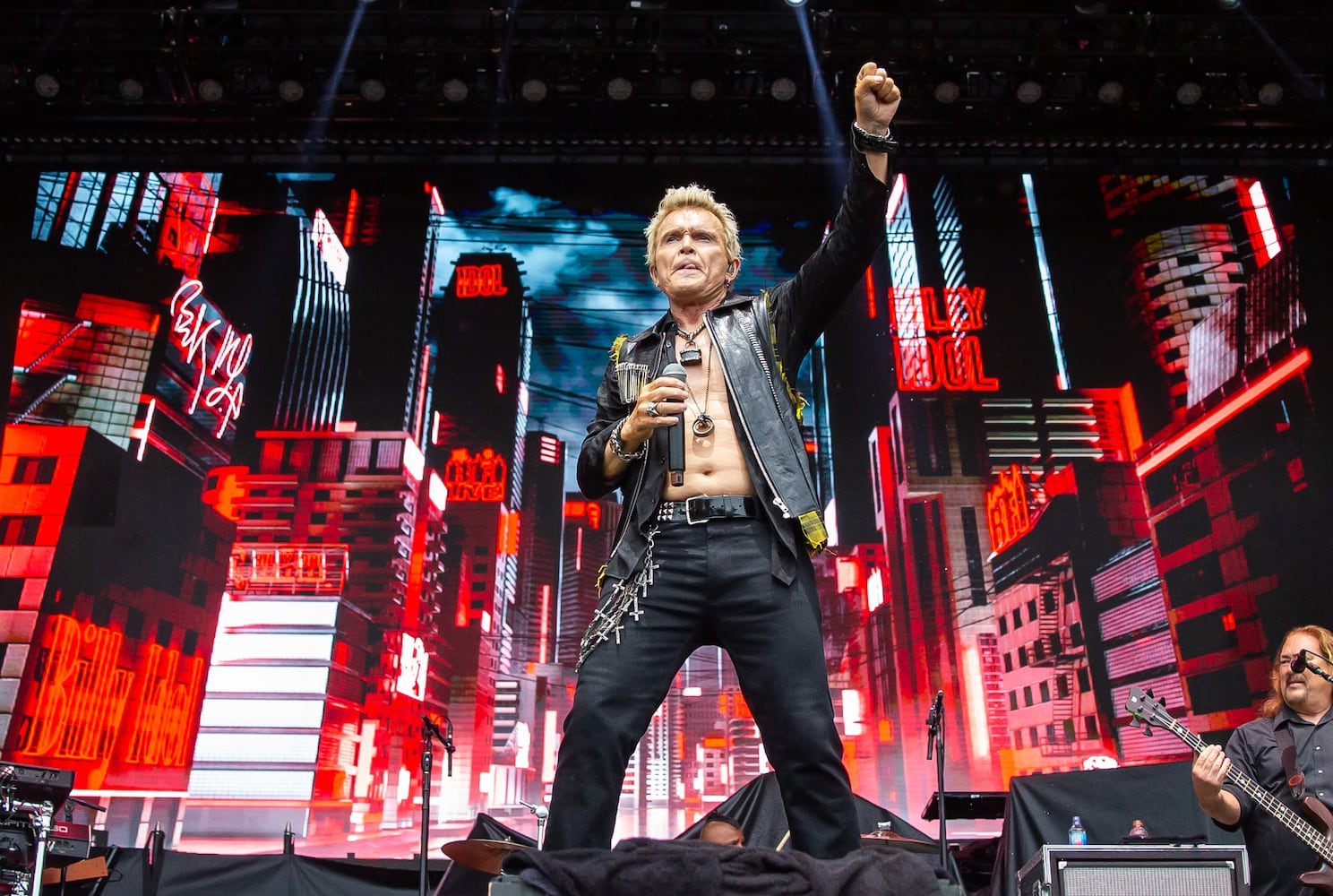 Atlanta, Ga: After a torrential downpour, Billy Idol came through and wowed the crowd with hits. The 68 year old didn't miss a beat despite wireless complications at the beginning of his set. Photo taken Sunday May 5, 2024 at Central Park, Old 4th Ward. (RYAN FLEISHER FOR THE ATLANTA JOURNAL-CONSTITUTION)