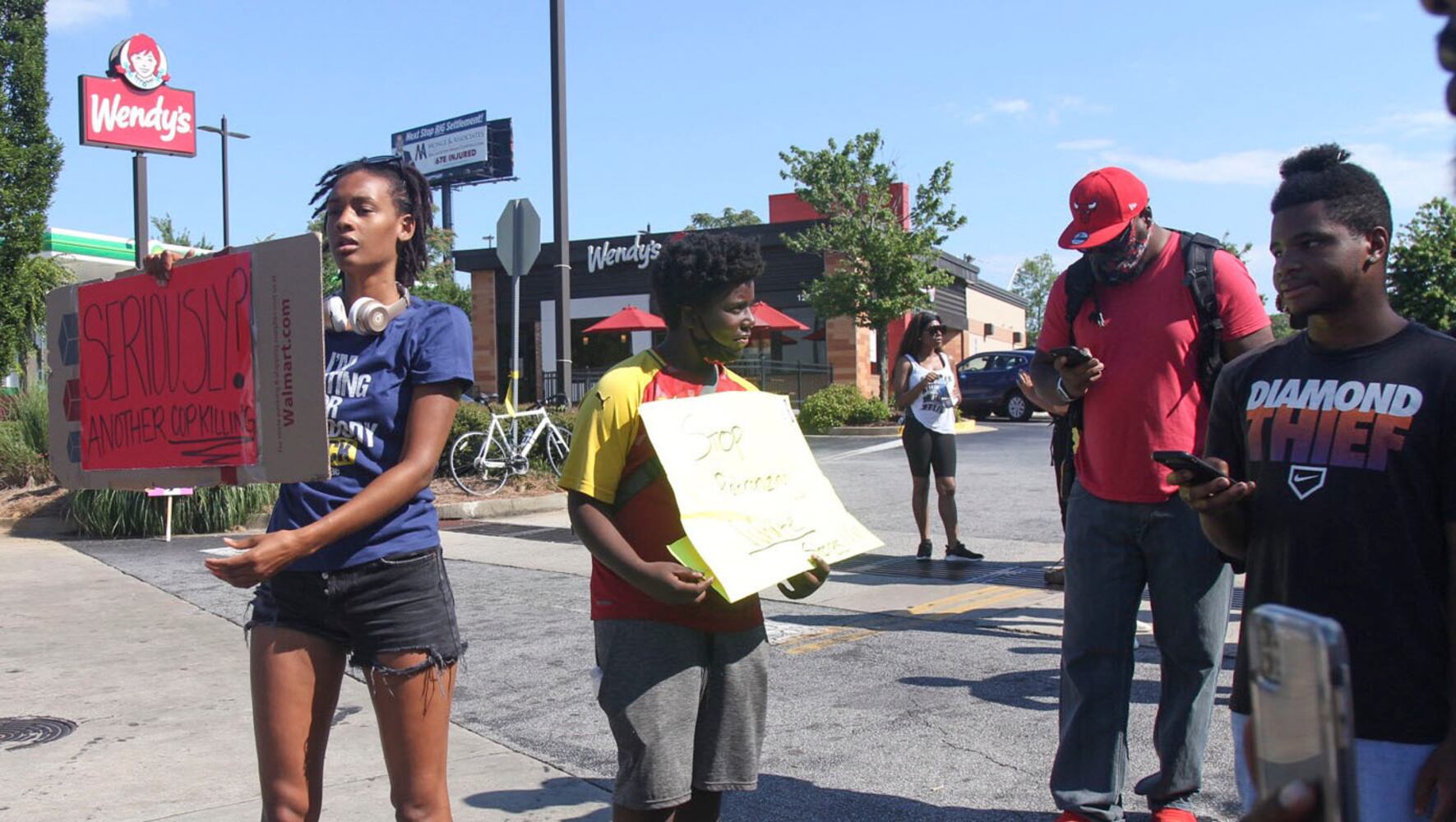 PHOTOS: Protesters hold demonstration in Atlanta over police shooting of Rayshard Brooks