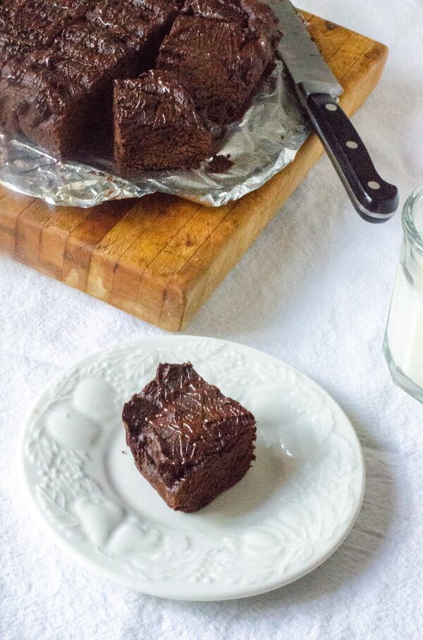 Besides the melted chocolate and the cocoa powder used in the batter for Black Bean Brownies, there's some chocolate drizzled on the top. (Virginia Willis for The Atlanta Journal-Constitution)