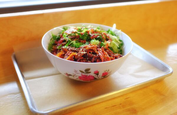 The Korean spicy pork bowl at Ssam Burger gets a flavor bomb from the Korean fermented chile paste gochujang. Photo by Wyatt Williams.