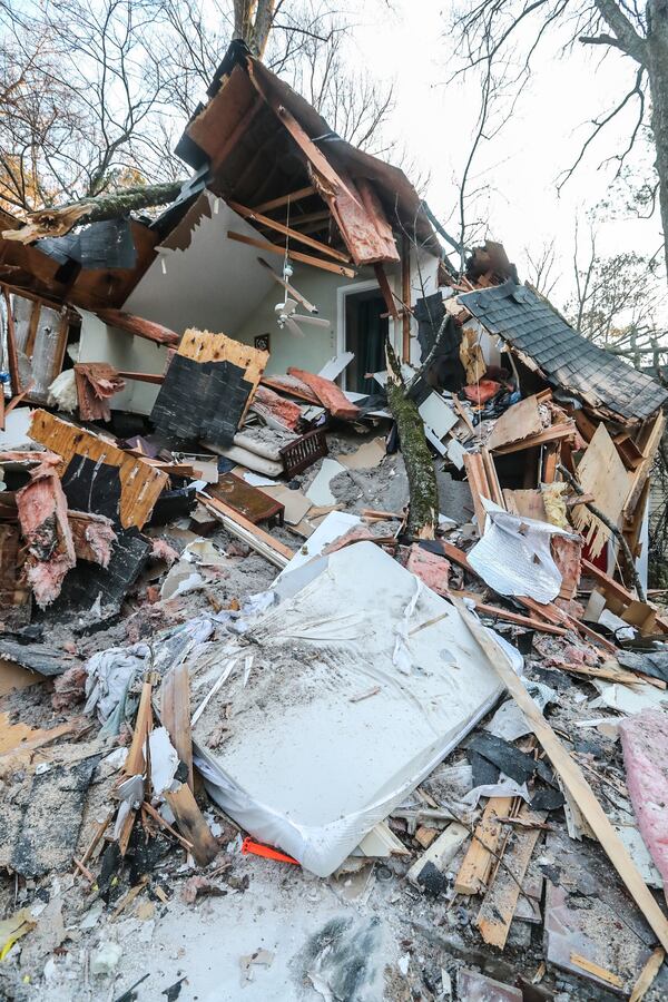 Officials said only the 47-year-old man was sleeping in the bedroom and was injured. A woman and a 6-month-old were sleeping in another part of the garage apartment because the baby was fussy that morning, according to Atlanta fire.