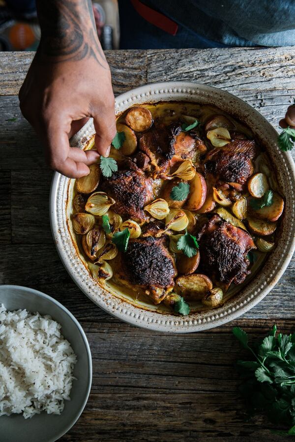 Curries have reached across oceans and continents and found their way into kitchens and cuisines around the world, including the Caribbean, writes Atlanta chef Asha Gomez. Pictured is Crucian Curry Chicken. The recipe is adapted by Asha Gomez from one by Digby Stridiron, executive chef of Braata and Ama in St. Croix, U.S. Virgin Islands. STYLING BY ASHA GOMEZ / CONTRIBUTED BY MEREDITH ZIMMERMAN