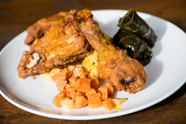  Southern Marinated Fried Chicken with three-cheese orecchiette, jalapeno collard green rolls, and sweet potato chutney. Photo credit- Mia Yakel.