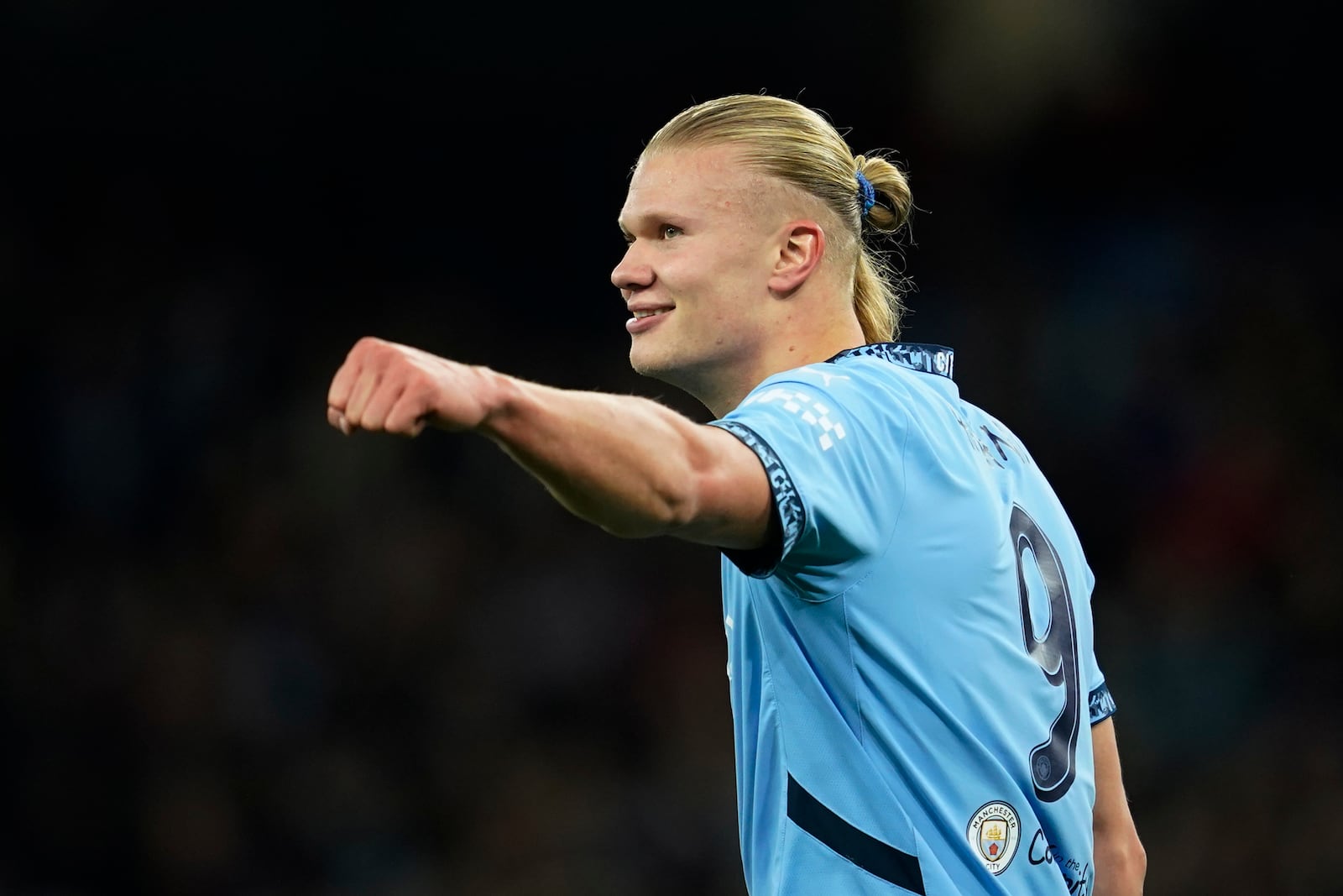 Manchester City's Erling Haaland celebrates after scoring his side's second goal during the Champions League opening phase soccer match between Manchester City and Sparta Praha at the Etihad Stadium in Manchester, England, Wednesday, Oct.23 , 2024. (AP Photo/Dave Thompson)