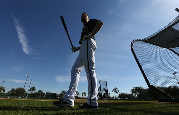 022716 LAKE BUENA VISTA: Braves first baseman Freddie Freeman, recovering from a right wrist injury, takes a break between pitchers while facing live pitching for the first time since last season during spring training on Saturday, Feb 27, 2016, at the ESPN Wide World of Sports, Lake Buena Vista, FL. Curtis Compton / ccompton@ajc.com