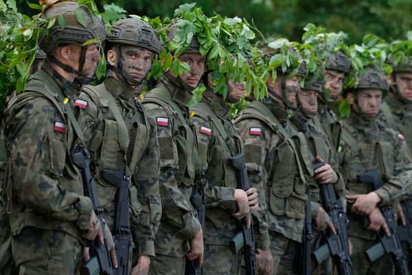 FILE - Volunteers takes part in basic training with the Polish army in Nowogrod, Poland, on June 20, 2024. (AP Photo/Czarek Sokolowski, File)