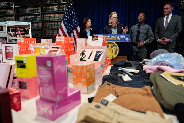 Queens District Attorney Melinda Katz speaks, as New York Gov. Kathy Hochul, New York State Police Superintendent Steven James and Homeland Security Investigations New York Special Agent in Charge William S. Walker looks on, at a press conference on an international stolen merchandise ring, Tuesday, Nov. 26, 2024, in the Queens borough of New York. (AP Photo/Julia Demaree Nikhinson)