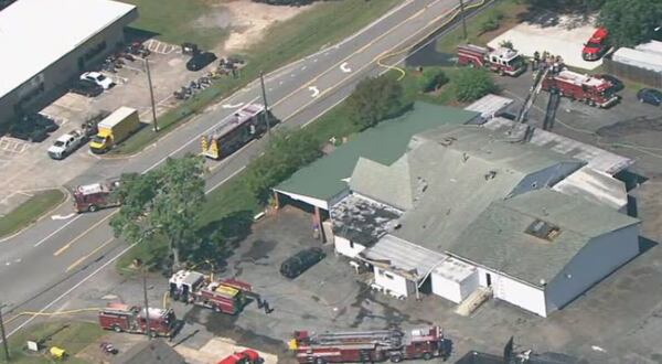 Several fire trucks surrounded the building when the blaze broke out around 2:30 p.m.