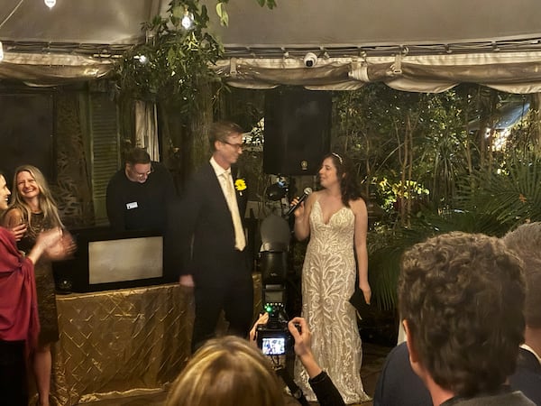 Tamar Hallerman and Mason Chilmonczyk celebrating their wedding. AJC/Greg Bluestein
