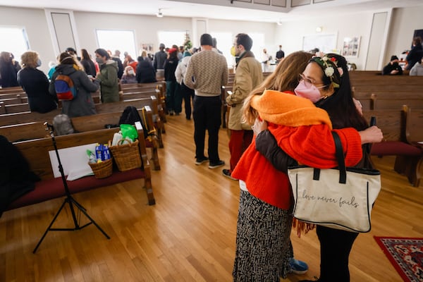 Belkis Terán, mother of the activist Manuel Terán “tortuguita” gets a hug from a forest defender as they celebrate a Memorial Day of healing at Park Avenue Baptist Church on Thursday, January 18, 2024.
Miguel Martinez /miguel.martinezjimenez@ajc.com