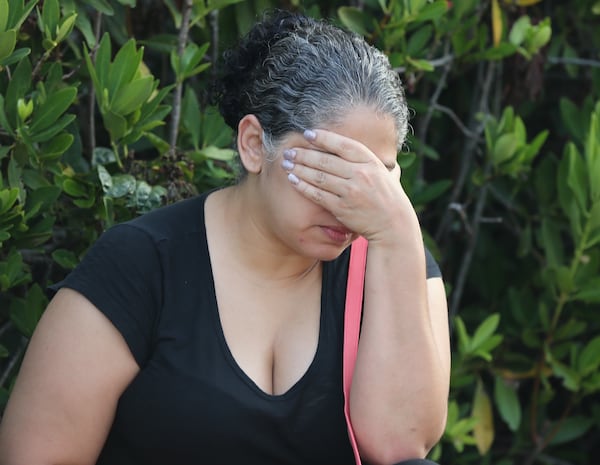 Pattie Rivera, wife of surviving Pulse DJ Ray Rivera, waits for information. Ray got out safely and was not injured when the shootings broke out. AJC photo: Curtis Compton