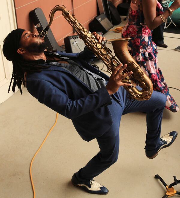 Tajh Derosier, saxophonist for Sierra Green & The Soul Machine, performs at a balcony concert at the New Orleans Jazz Museum. 
Courtesy of Eliot Kamenitz