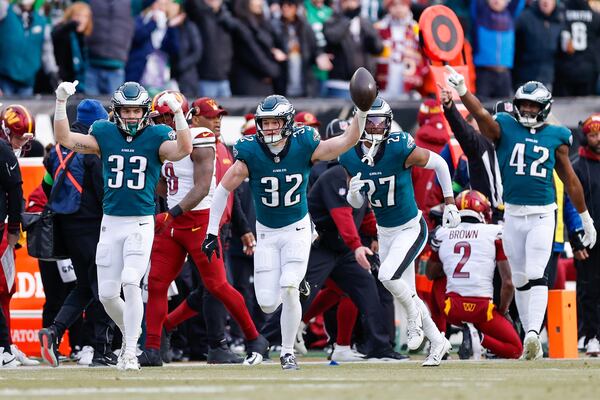 Philadelphia Eagles safety Reed Blankenship (center) celebrates a fumble recovery during the first quarter of the NFC Championship game against the Washington Commanders Sunday, Jan. 26, 2025, at Lincoln Financial Field in Philadelphia. (Yong Kim/The Philadelphia Inquirer/TNS)