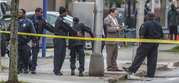 June 29, 2018 Atlanta: The Fulton County District Attorney’s office came to the scene to investigate all 3-shootings Friday, June 29, 2018. Atlanta Officers on the active crime scene heard the shots fired in the Greyhound bus parking lot, killing the 57-year-old witness they’d just interviewed.  JOHN SPINK/JSPINK@AJC.COM